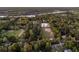 Aerial view showcases estate with horse training facilities and lush green pastures near river at 3610 Legareville Rd, Johns Island, SC 29455