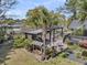 Outdoor patio featuring a kitchen, fire pit, and seating with waterfront views at 3610 Legareville Rd, Johns Island, SC 29455
