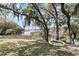 Relaxing backyard setting with a tree swing and serene waterfront views at 3610 Legareville Rd, Johns Island, SC 29455