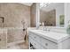 Well-lit bathroom featuring a tiled walk-in shower, a modern vanity, and contemporary finishes at 3610 Legareville Rd, Johns Island, SC 29455