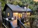 Charming exterior view showcasing a private deck and landscaped yard at 3610 Legareville Rd, Johns Island, SC 29455