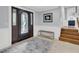 Inviting entryway with a decorative front door and elegant staircase at 3610 Legareville Rd, Johns Island, SC 29455