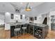 Entertainer's dream kitchen with stainless appliances, granite counters, wine storage, and seating at 3610 Legareville Rd, Johns Island, SC 29455