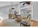 Comfortable living room with stylish decor, high ceilings, and a soothing color palette at 3610 Legareville Rd, Johns Island, SC 29455