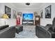 Cozy living room with comfortable seating and a home theatre, perfect for relaxation and entertainment at 3610 Legareville Rd, Johns Island, SC 29455