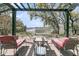 Inviting outdoor seating area featuring a hammock with serene water views, perfect for relaxation at 3610 Legareville Rd, Johns Island, SC 29455