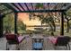 Relaxing outdoor patio featuring comfortable lounge chairs, hammock, and scenic waterfront views at 3610 Legareville Rd, Johns Island, SC 29455