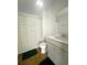 Bathroom with a striped shower curtain and dark green bathmat at 362 Lake Ridge Blvd, Summerville, SC 29486