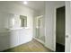 Bright bathroom featuring double sinks and modern glass-enclosed shower at 362 Lake Ridge Blvd, Summerville, SC 29486