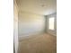 Neutral carpeted bedroom featuring a window with natural light at 362 Lake Ridge Blvd, Summerville, SC 29486