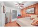 Cozy bedroom featuring a wood paneled accent wall and a peaceful atmosphere at 364 Dupre Rd, McClellanville, SC 29458
