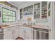 Charming kitchen featuring stainless steel appliances, granite countertops, and classic cabinetry at 364 Dupre Rd, McClellanville, SC 29458