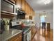 Well-equipped kitchen with stainless steel appliances and sleek countertops at 411 Red Fox Run, Summerville, SC 29485