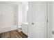 Pristine bathroom with wood-look floors, tub-shower, and a modern vanity at 412 Pender Woods Dr, Summerville, SC 29486