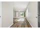Entryway view showcases the bright and airy living room with access to outdoor patio through sliding glass doors at 412 Pender Woods Dr, Summerville, SC 29486