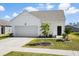 Well-kept single-story home boasting a garage, maintained lawn, and a welcoming front entrance at 412 Pender Woods Dr, Summerville, SC 29486
