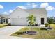 Attractive single-story home with a garage, manicured landscaping, and curb appeal at 412 Pender Woods Dr, Summerville, SC 29486