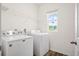 Well-equipped laundry room with modern appliances and ample shelving at 412 Pender Woods Dr, Summerville, SC 29486