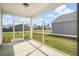 Relaxing screened porch overlooking the backyard, perfect for enjoying the outdoors at 412 Pender Woods Dr, Summerville, SC 29486