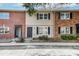 Charming townhome exterior with brick and siding facade and dark shutters at 415 Parkdale Dr # 12D, Charleston, SC 29414
