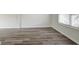 View of living room with luxury vinyl plank flooring and white trim at 415 Parkdale Dr # 12D, Charleston, SC 29414