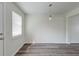 Bright living room with luxury vinyl flooring and modern lighting at 415 Parkdale Dr # 12D, Charleston, SC 29414