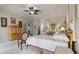 Comfortable bedroom featuring a ceiling fan, a large bed, and classic decor at 421 Royal Assembly Dr, Charleston, SC 29492