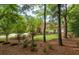 Exterior of property surrounded by trees and landscaping at 421 Royal Assembly Dr, Charleston, SC 29492