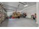 Spacious garage with an open door, ample storage, and parking for vehicles at 421 Royal Assembly Dr, Charleston, SC 29492