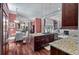 Open concept kitchen with granite countertops, a center island with cooktop, and stainless steel appliances at 421 Royal Assembly Dr, Charleston, SC 29492