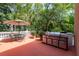 An outdoor grill area with a grill and seating at 421 Royal Assembly Dr, Charleston, SC 29492