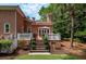 Inviting brick patio with seating and white railings offers a serene outdoor space at 421 Royal Assembly Dr, Charleston, SC 29492