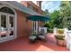 Covered patio with seating area and open views of the backyard at 421 Royal Assembly Dr, Charleston, SC 29492