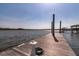 Wooden pier extends into the water, providing a tranquil waterfront view at 421 Royal Assembly Dr, Charleston, SC 29492
