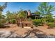 Wooden boat playground featuring a slide is set among trees for a fun outdoor recreational space at 421 Royal Assembly Dr, Charleston, SC 29492