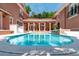 Stunning in-ground pool with elegant column reflections and luxurious outdoor living space at 421 Royal Assembly Dr, Charleston, SC 29492