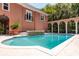 Backyard pool with stone accents, a fountain feature, and access to the colonnade at 421 Royal Assembly Dr, Charleston, SC 29492