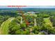 Aerial image features the property's location near a golf course and highlights community amenities and scenic surroundings at 4403 Wild Thicket Ln, North Charleston, SC 29420