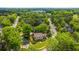 Aerial view of the home nestled among lush trees, showcasing its prime location and scenic surroundings at 4403 Wild Thicket Ln, North Charleston, SC 29420