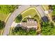 An aerial view displays this home's beautifully landscaped yard, complete with mature trees and manicured shrubbery at 4403 Wild Thicket Ln, North Charleston, SC 29420