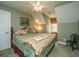 Comfortable bedroom with green walls, natural lighting, and an upholstered bed at 4403 Wild Thicket Ln, North Charleston, SC 29420