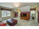 Bonus room with a plush couch, large windows, and carpeted floors at 4403 Wild Thicket Ln, North Charleston, SC 29420