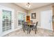 Bright dining area with natural light and access to an outdoor area at 4403 Wild Thicket Ln, North Charleston, SC 29420