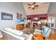 Inviting living room with vaulted ceilings, fireplace, hardwood floors, and comfortable seating at 4403 Wild Thicket Ln, North Charleston, SC 29420