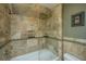 Detailed shot of the tiled shower and tub, showcasing the tile work at 4403 Wild Thicket Ln, North Charleston, SC 29420