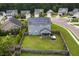 Aerial view of fenced yard with a screened in porch and solar panels in a Gathering neighborhood at 504 Foxbank Plantation Blvd, Moncks Corner, SC 29461