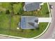 Bird's eye view of a fenced backyard with solar panels and a screened in porch at 504 Foxbank Plantation Blvd, Moncks Corner, SC 29461