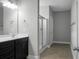 Bright bathroom with a sleek vanity, modern sink, and glass shower, providing a functional and stylish space at 504 Foxbank Plantation Blvd, Moncks Corner, SC 29461