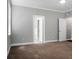 Spacious bedroom featuring two entry doorways, neutral paint, and a ceiling fan at 504 Foxbank Plantation Blvd, Moncks Corner, SC 29461
