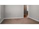 Bedroom with carpeted floor and doorway that lets in ample light at 504 Foxbank Plantation Blvd, Moncks Corner, SC 29461